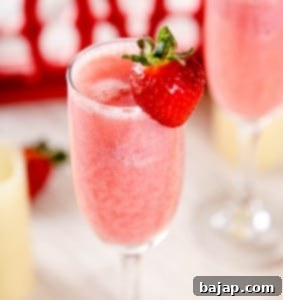 An easy make-ahead Strawberry Mimosa recipe, perfect for brunch or a romantic Valentine's Day treat.