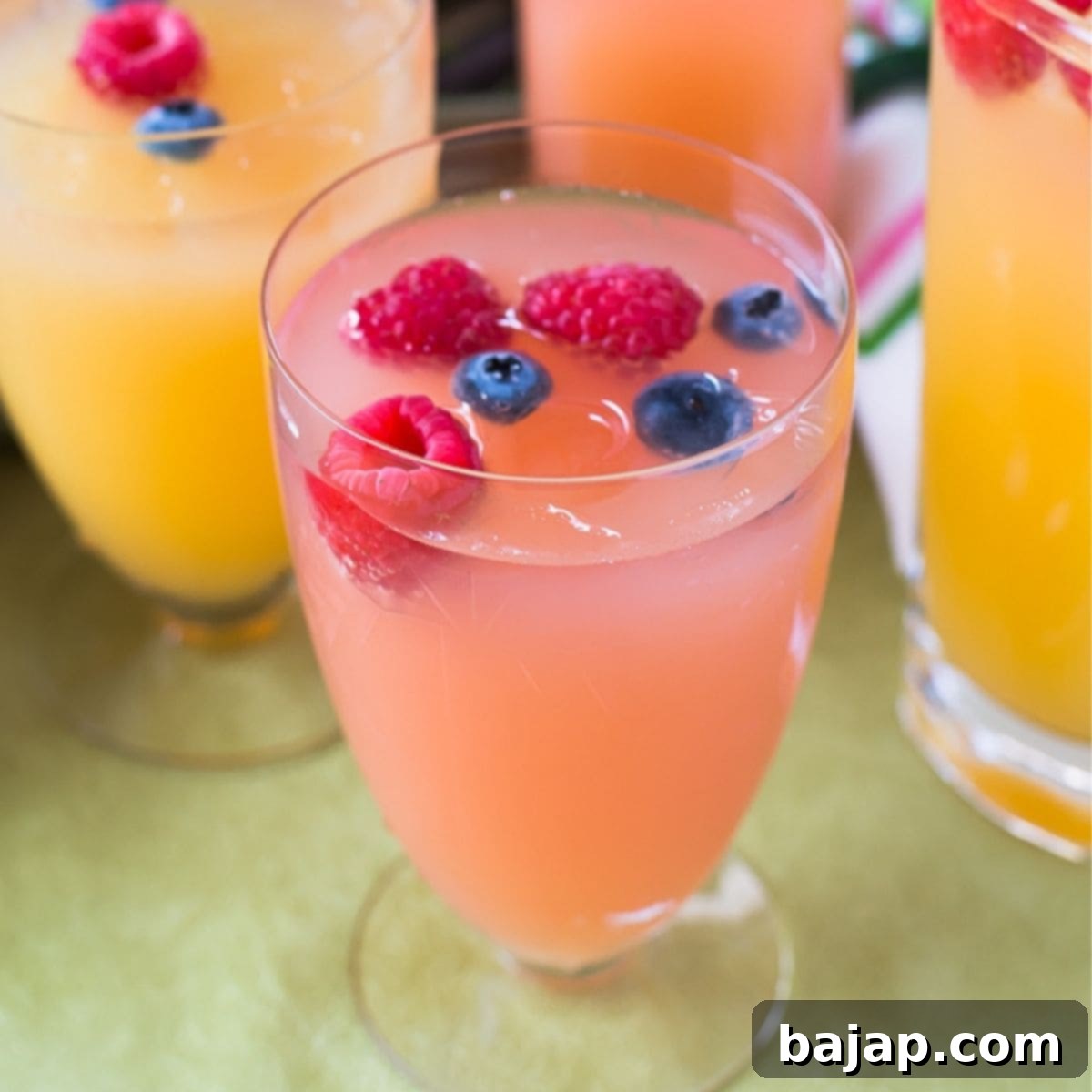 A delicate Pink Rose Mimosa, a floral cocktail with a sophisticated rose flavor, perfect for Mother's Day or a spring garden party.