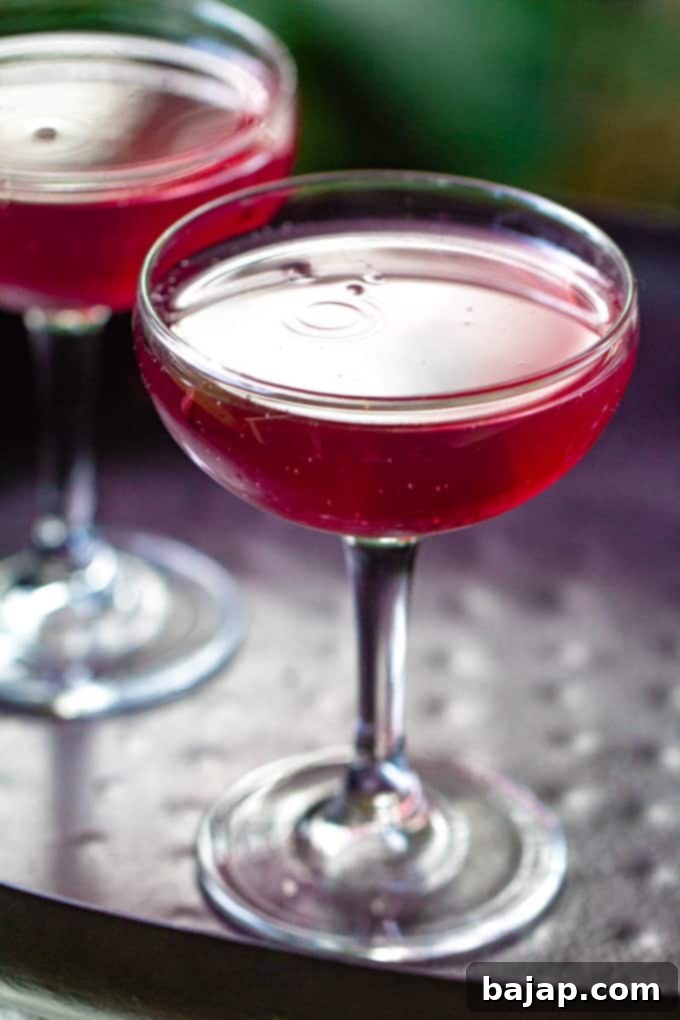 An adult-style Dirty Shirley Mimosa, a sweet cocktail twist on a classic Shirley Temple with a bubbly mimosa touch.