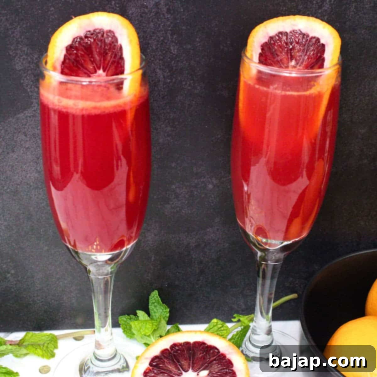 A vibrant 3-ingredient Blood Orange Mimosa, an effortless and delicious addition to your winter brunch routine.