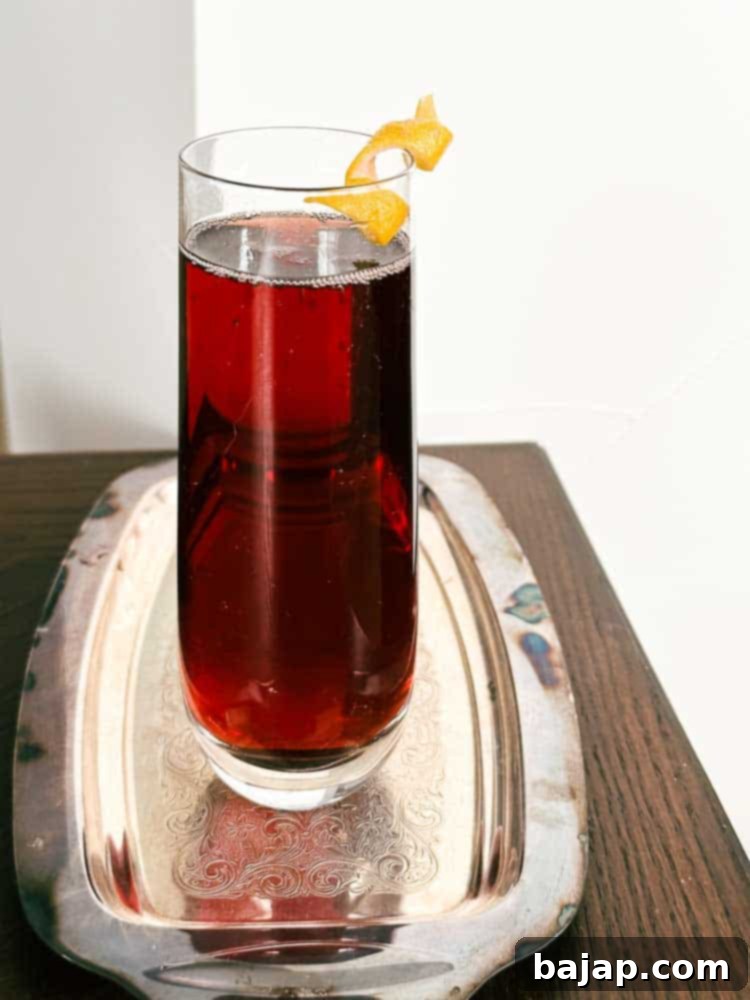A light and refreshing Cherry Mimosa, combining the flavors of cherry, lemon, and bitters with sparkling wine.
