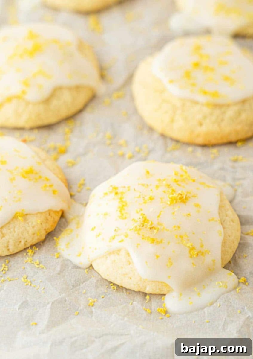 Glazed Italian Lemon Ricotta Cookies, soft and melt-in-your-mouth, with fresh lemon zest.