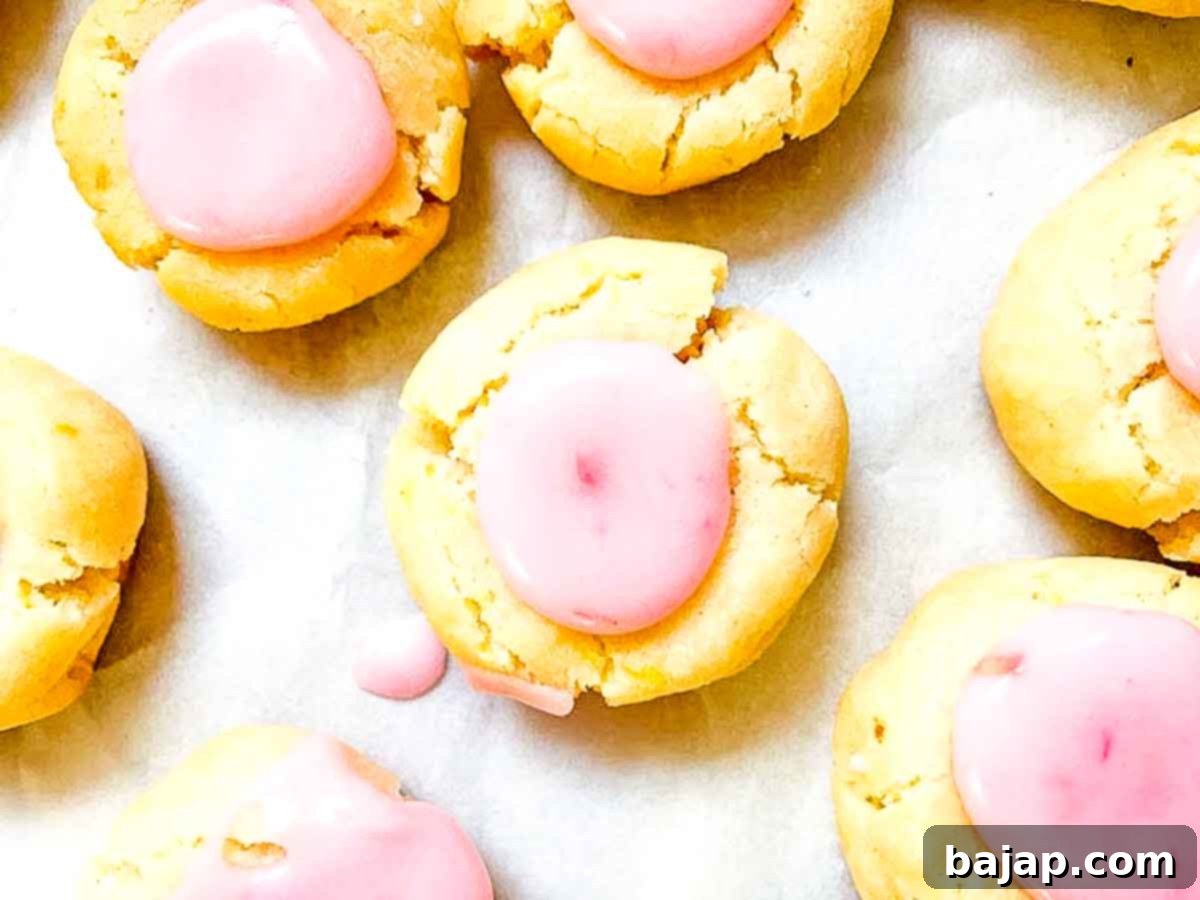 Fresh Raspberry Lemon Thumbprint Cookies, perfect for brunch or high tea, showing the vibrant fruit and citrus icing.