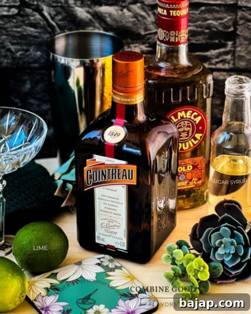 Ingredients for a classic margarita - lime juice, sugar syrup, cointreau and tequila.