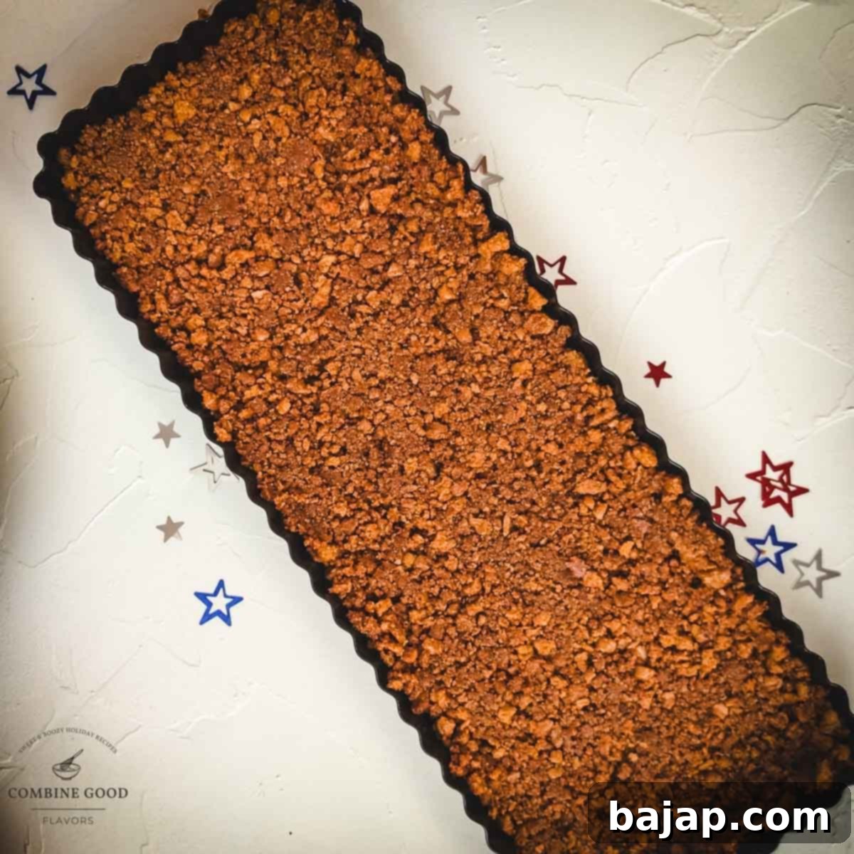 The finished Lotus Biscoff crust, pressed and ready for the creamy filling.