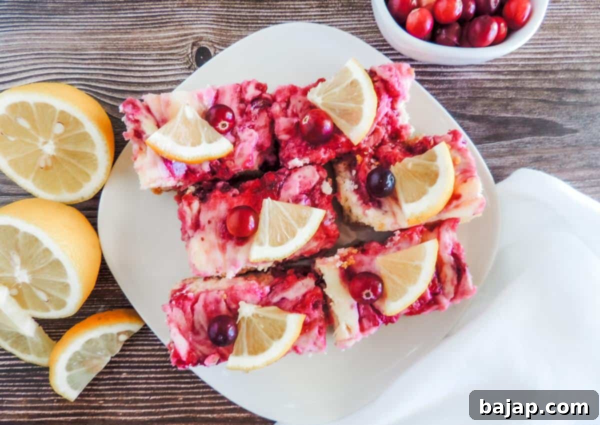 Lemon Cranberry Cheesecake Bars on a serving platter