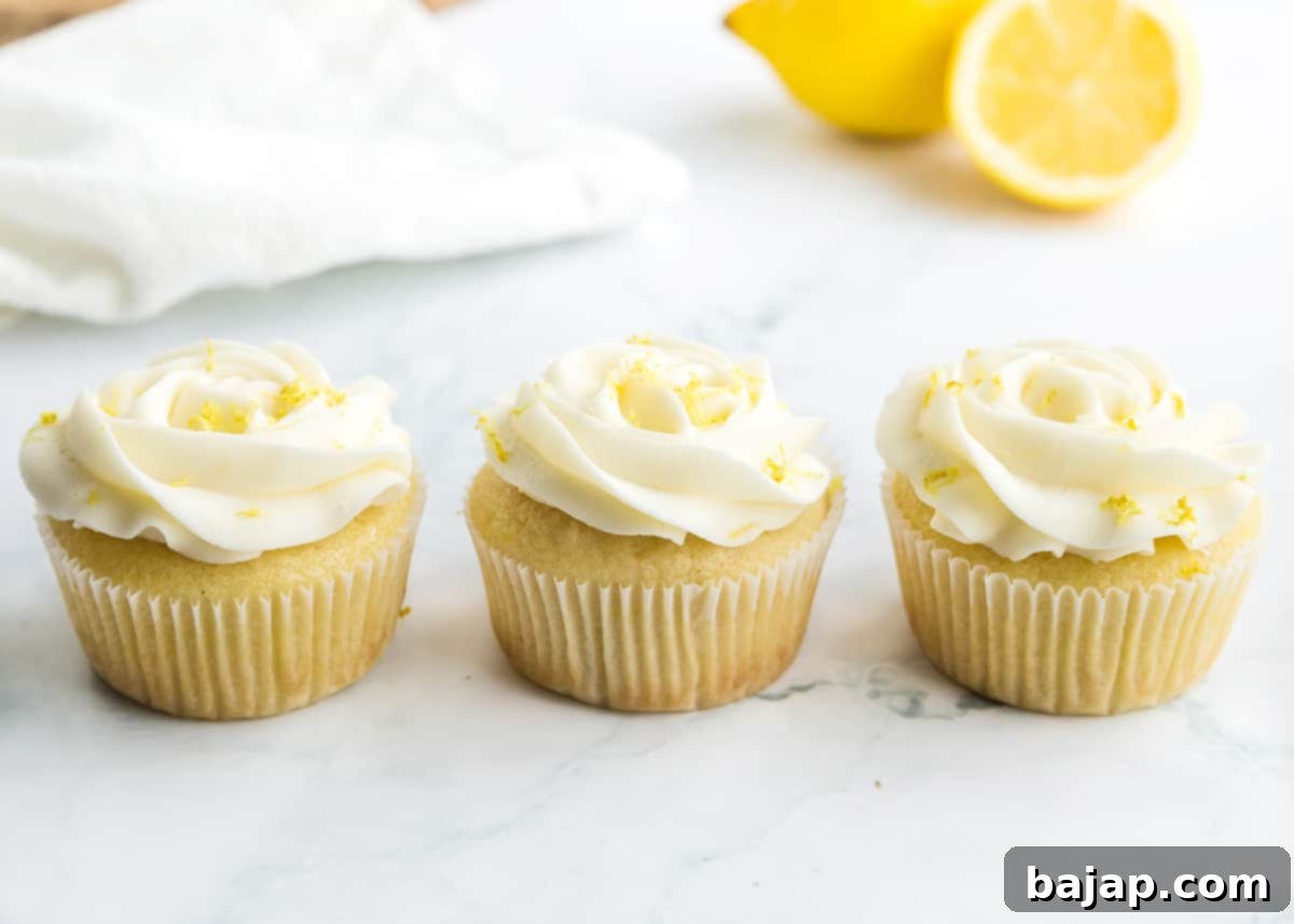 Bright yellow lemon cupcakes with lemon buttercream frosting