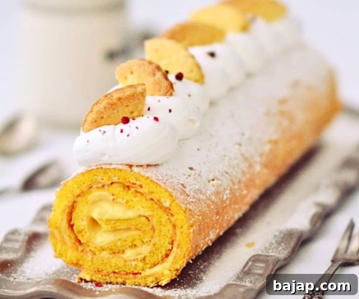 A delicate lemon Swiss roll cake, sliced to show the spiral filling.
