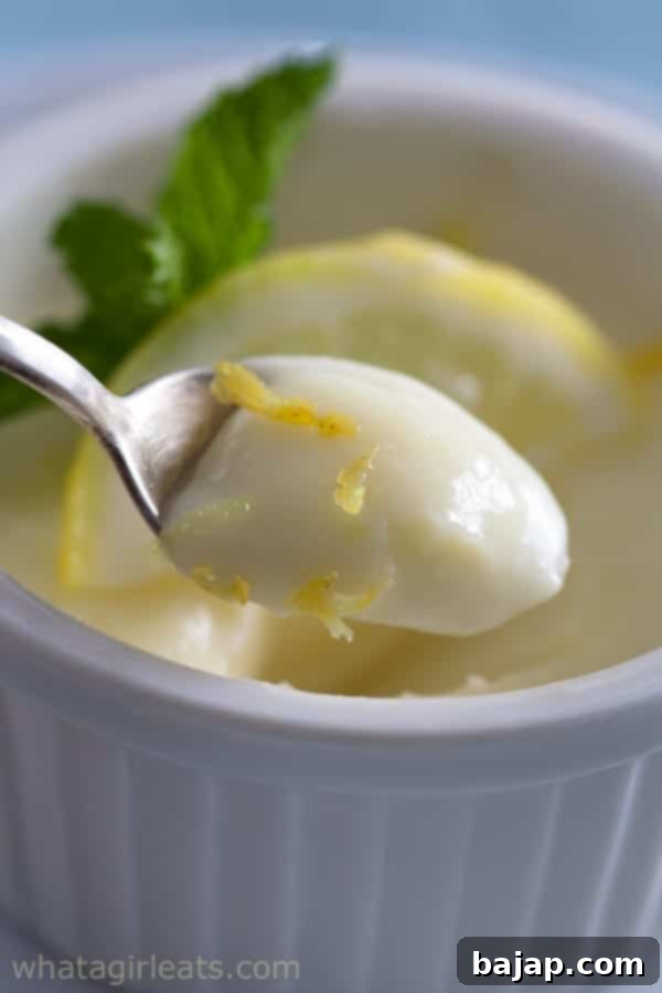 Creamy lemon posset served in a delicate ramekin.