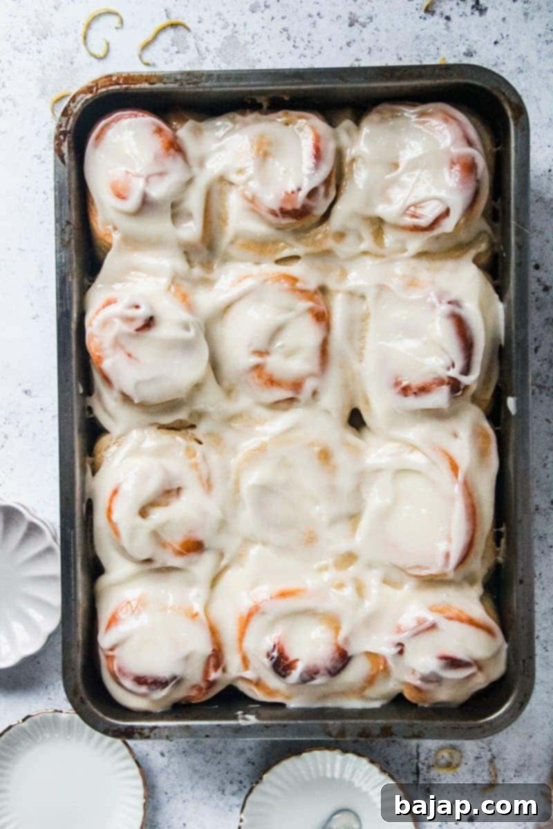 Soft and fluffy homemade lemon rolls with a glaze.