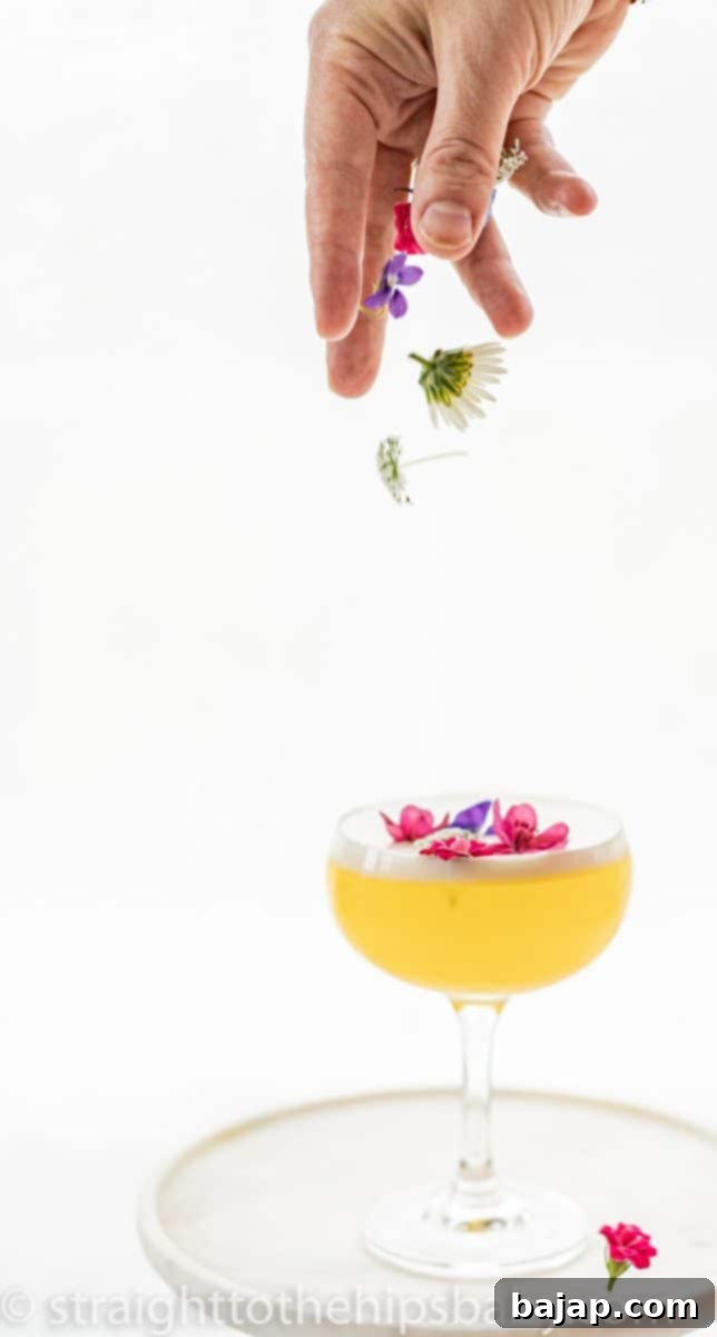 The Lemon Flora, a light and citrusy Gin Sour with a frothy egg white top.