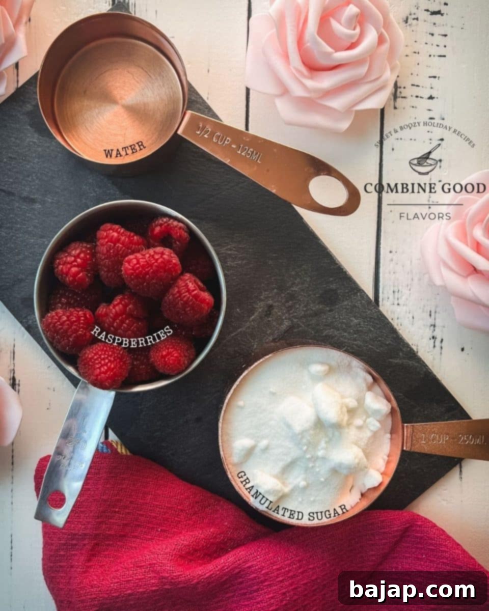 Ingredients for making raspberry syrup - fresh raspberries, sugar, and water.