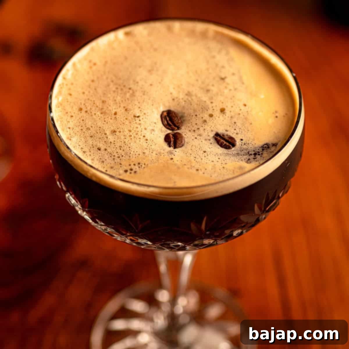 Tequila Espresso Martini cocktail with coffee beans