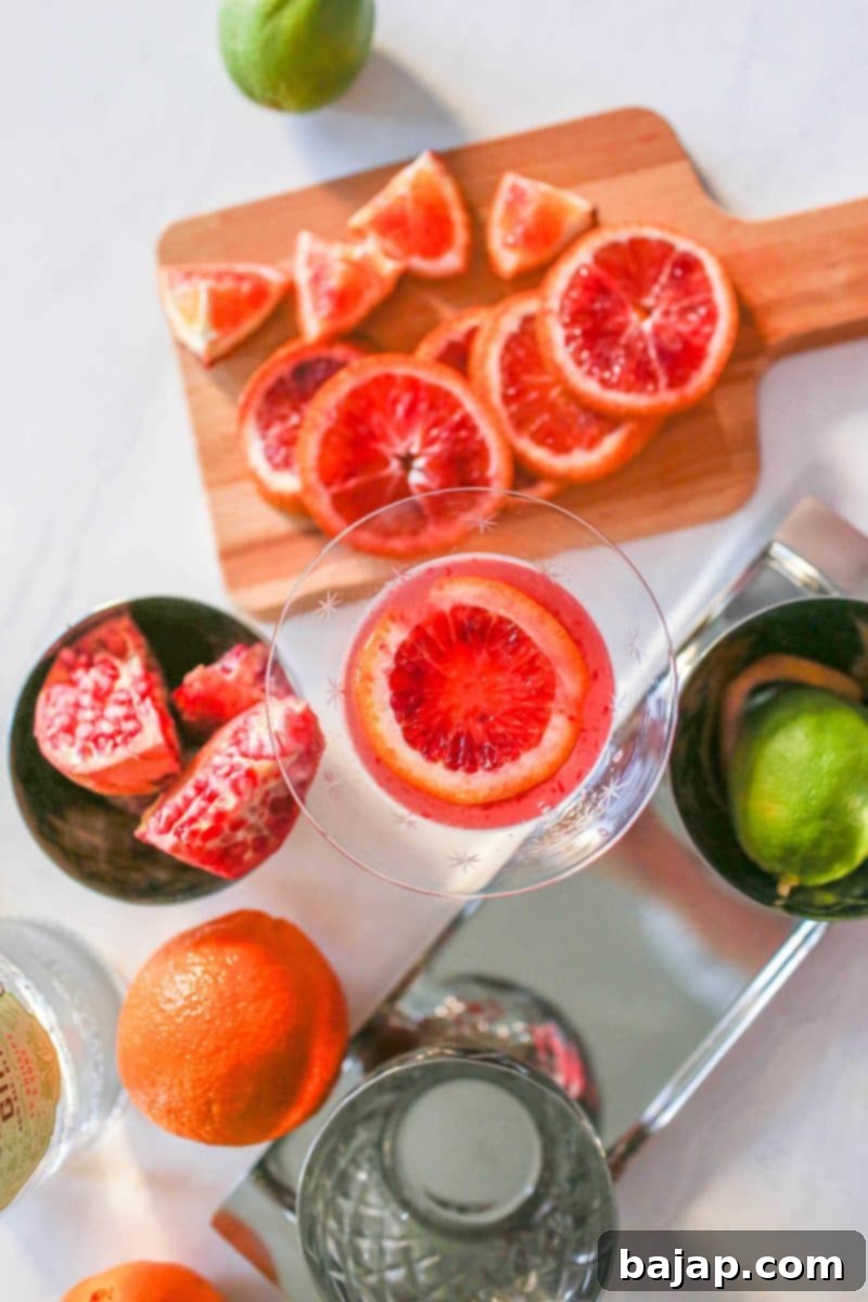 Blood Orange Martini with organic gin, garnished with blood orange slices