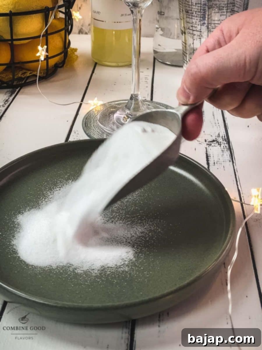 Adding the granulated sugar to a small green plate.