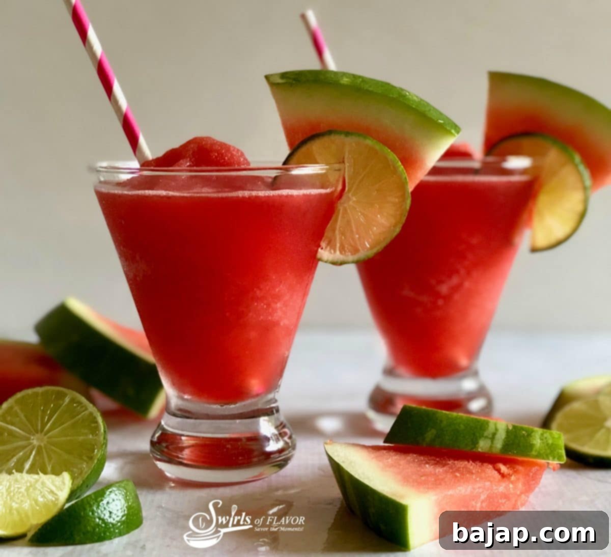 A refreshing glass of watermelon Frosé, a frozen rosé drink, perfect for a hot summer day.