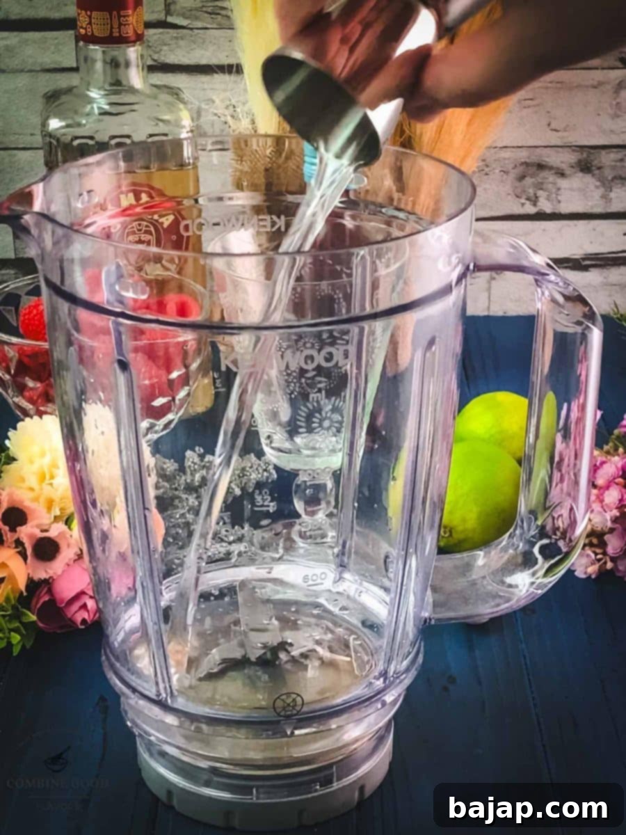 Add Cointreau to the blender.