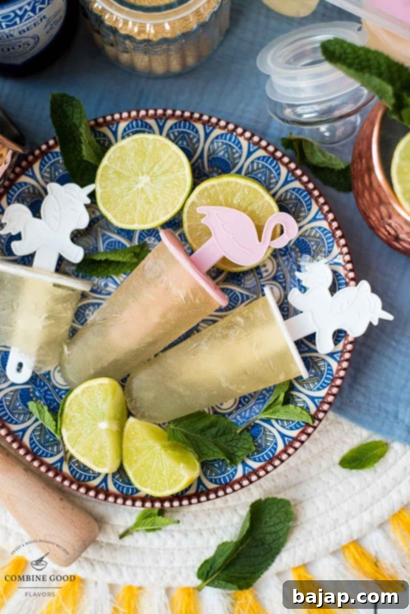 Gorgeous and refreshing Moscow mule popsicles placed on patterned plate.