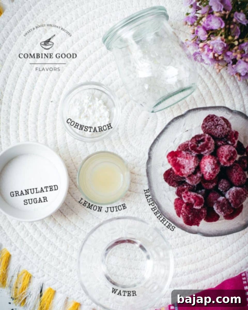 Ingredients for raspberry cheesecake topping - raspberries, cornstarch, granulated sugar, lemon juice, and water.