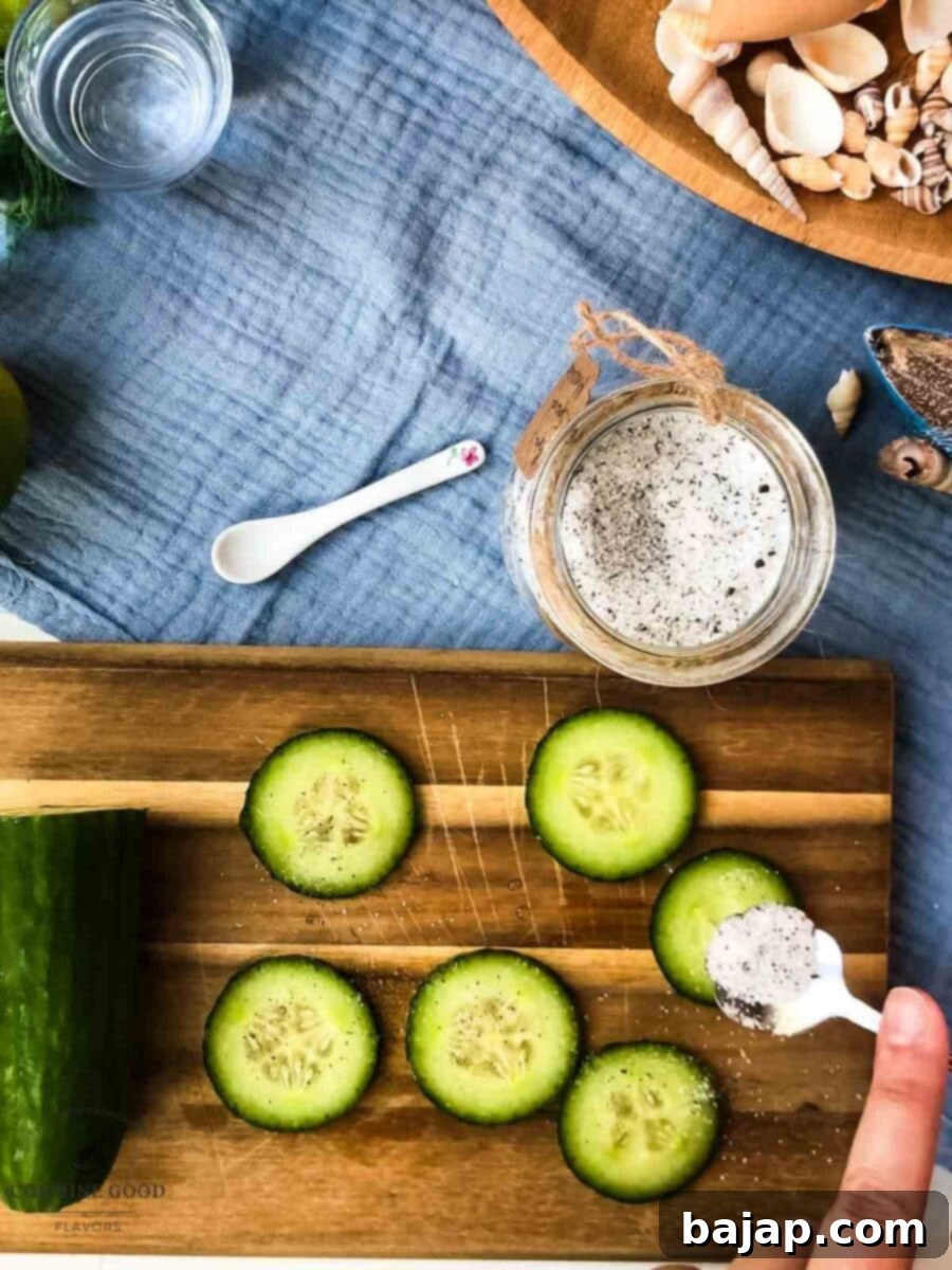 Freshly sliced cucumber pieces are carefully sprinkled with homemade mint sugar, infusing them with sweet, aromatic flavor for the Moscow Mule.
