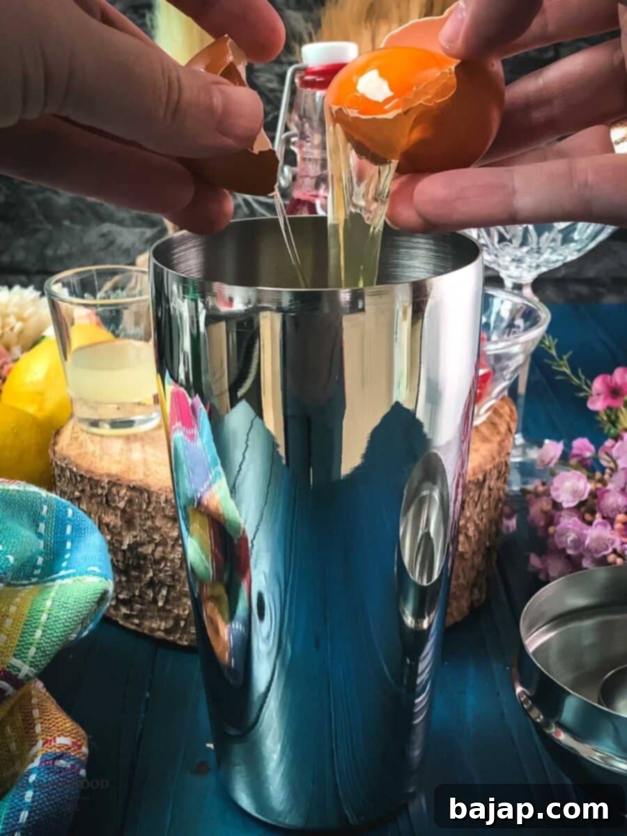 Separate the eggs and add only the egg whites to the cocktail shaker.