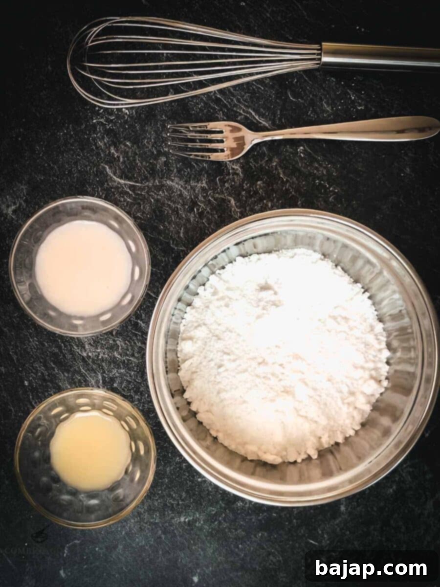 Ingredients for the glaze: Lemon juice, rice milk, and powdered sugar. Essential for the spiderweb cookie's iconic design.