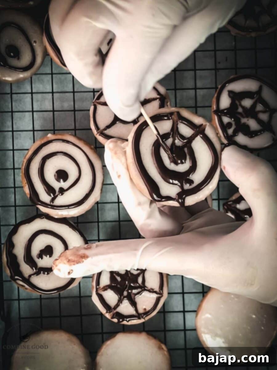 Spooky Sweet Spiderweb Treats 10 Drag a toothpick from the center outward to create a spider web pattern.