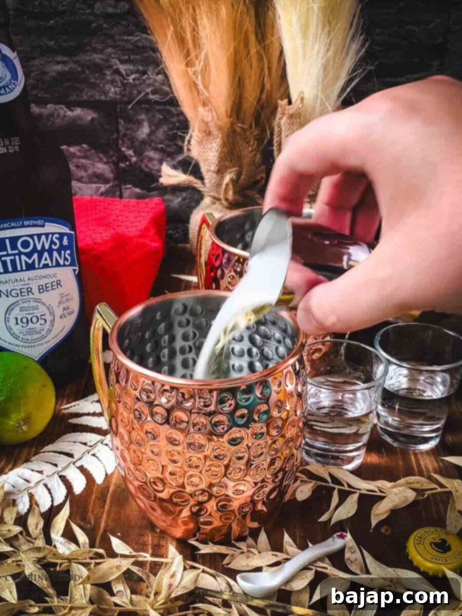 Autumn Apple Cider Moscow Mule 4 Add apple cider to your copper mugs.