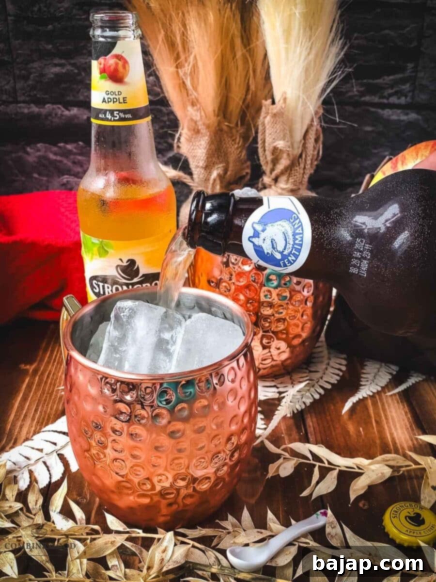 Autumn Apple Cider Moscow Mule 8 Top your apple cider Moscow mule with ginger beer.