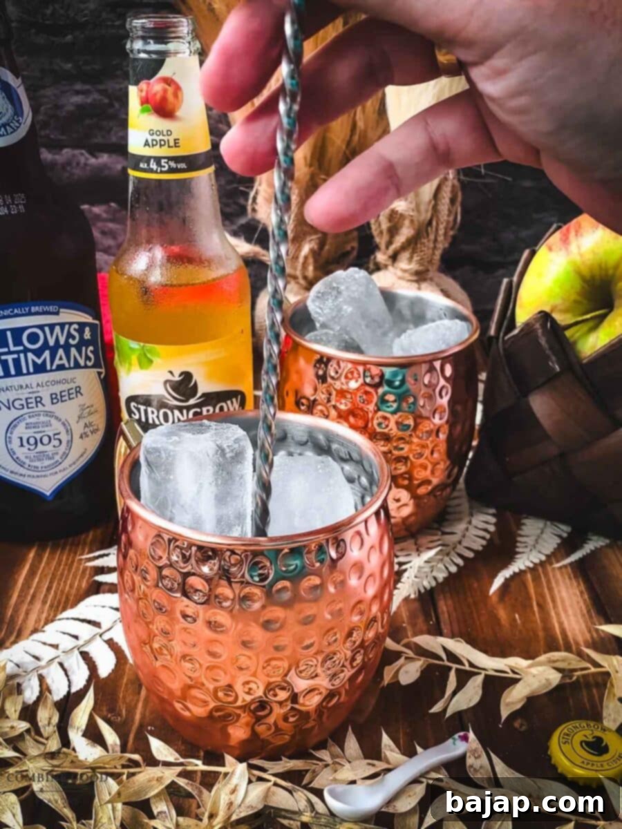 Crisp Apple Mule 9 Stir your apple cider Moscow mule with a bar spoon.