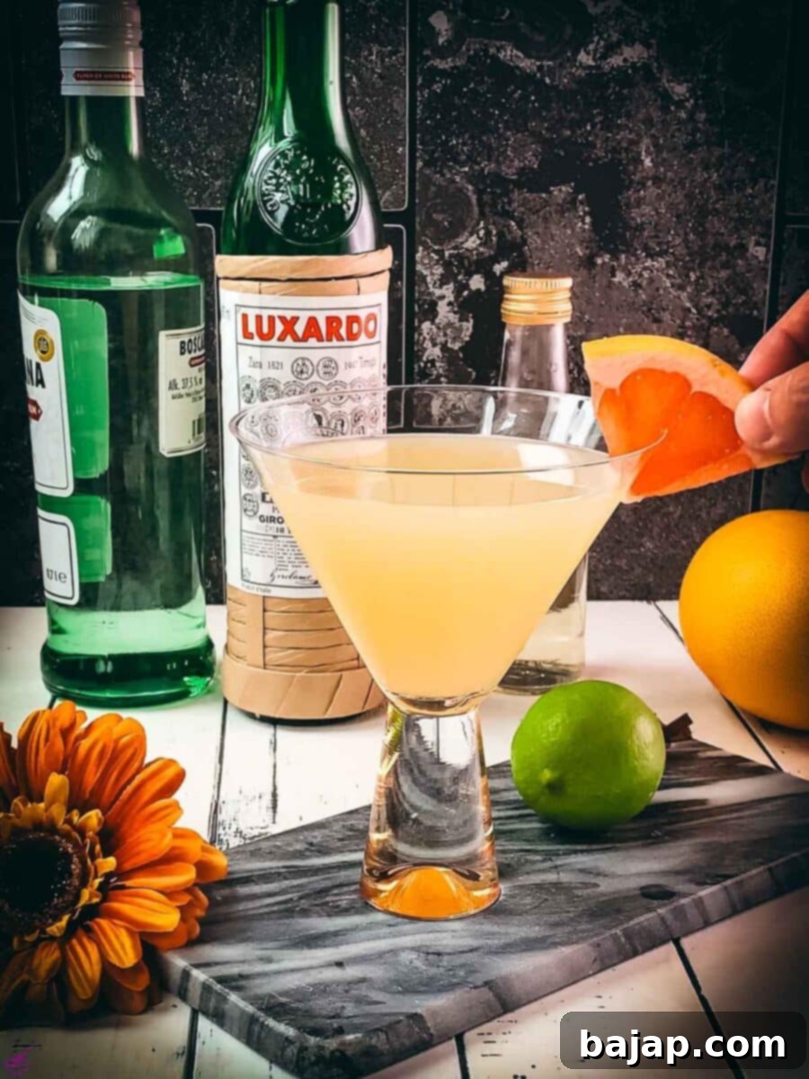Garnish with a grapefruit slice.