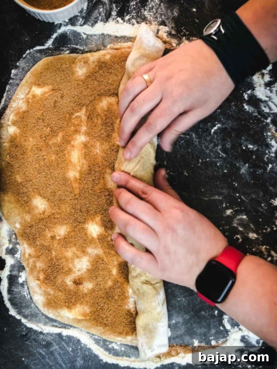 Roll the dough tightly from the wide side and use kitchen string to cut it into finger-thick slices.