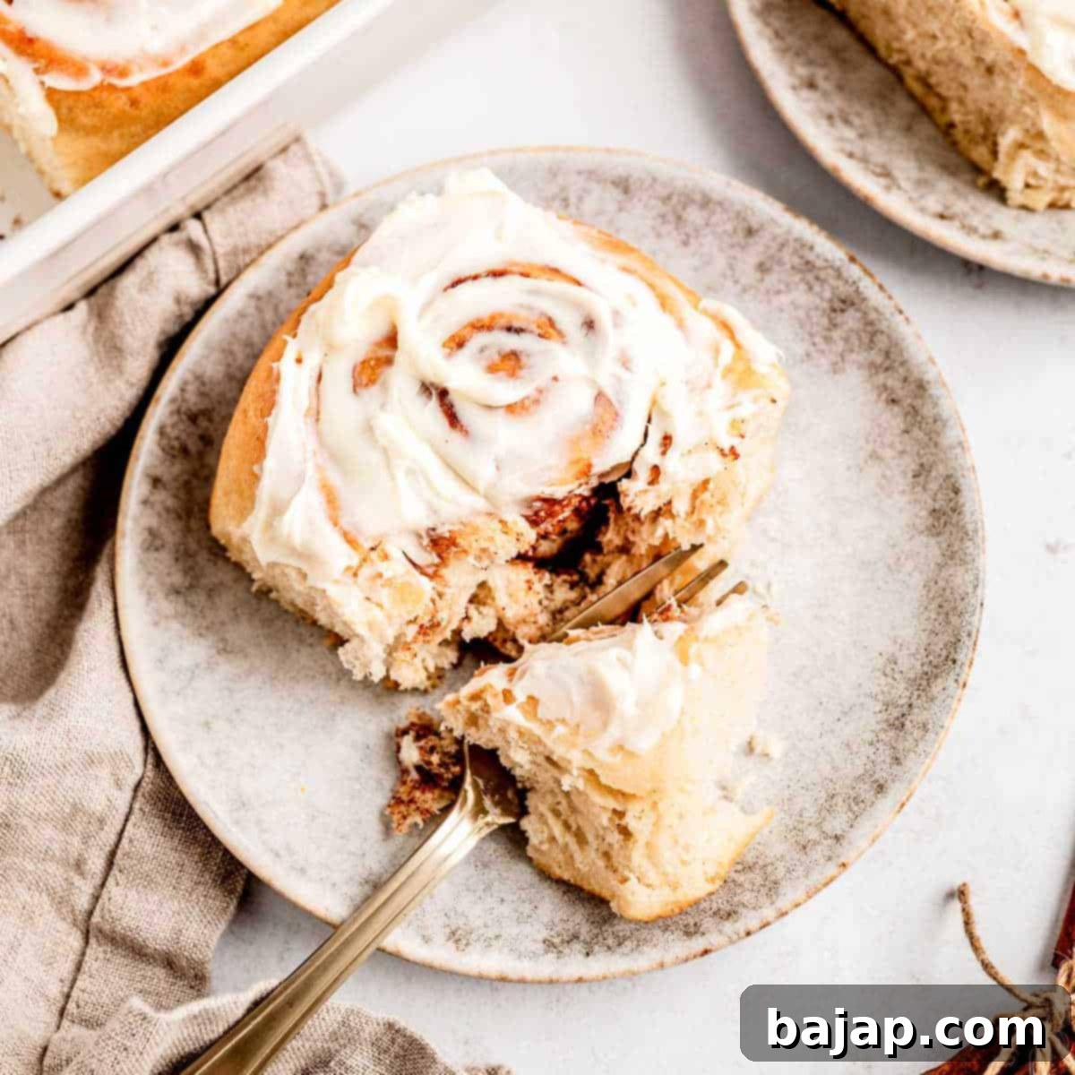 Healthy homemade protein cinnamon rolls, rich in protein and lower in sugar, topped with a light glaze.