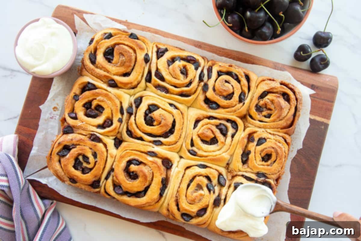 Cherry Sweet Rolls with Almond Cream Cheese Icing