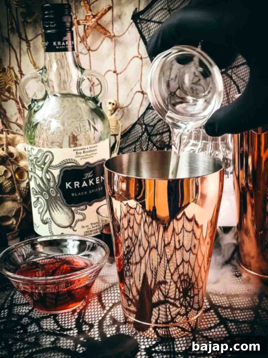 Add sugar syrup to the cocktail shaker tin.