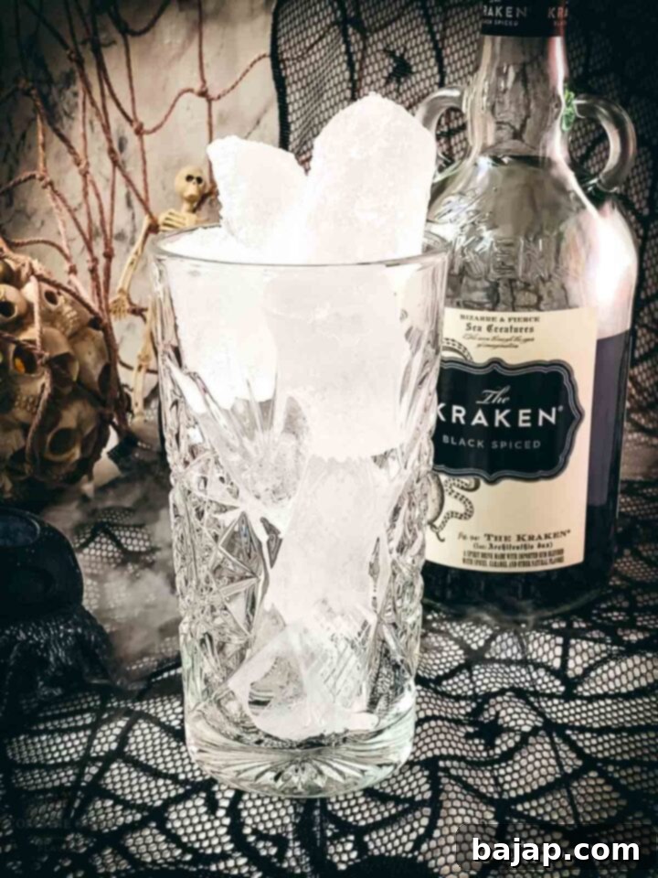 Step 1: Fill a highball glass with ice.