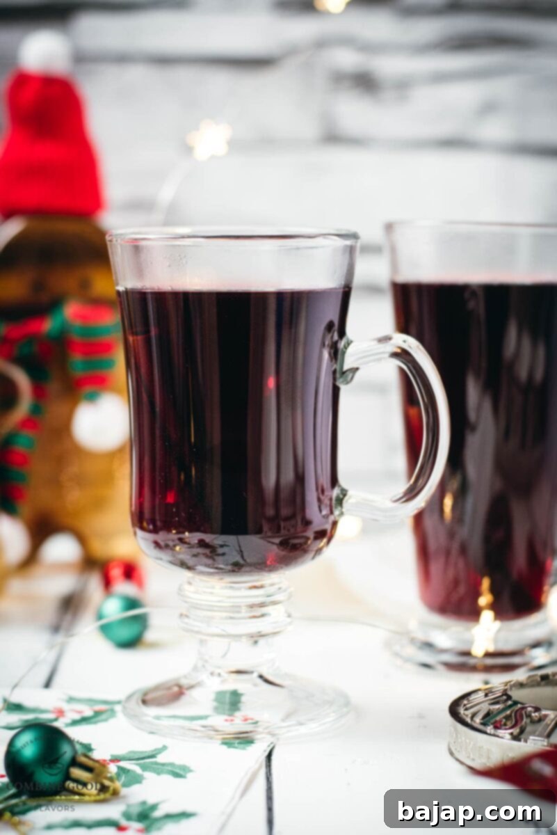 Warming Mulled Wine 6 Gorgeous glasses filled with mulled placed next to Christmas decor.