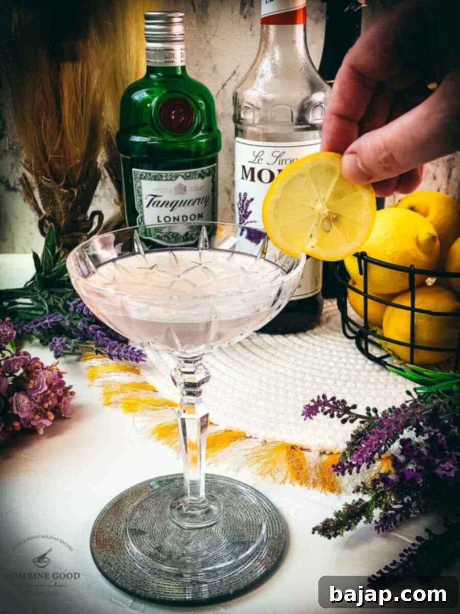 Garnish the finished cocktail with a fresh lemon slice for presentation and aroma.