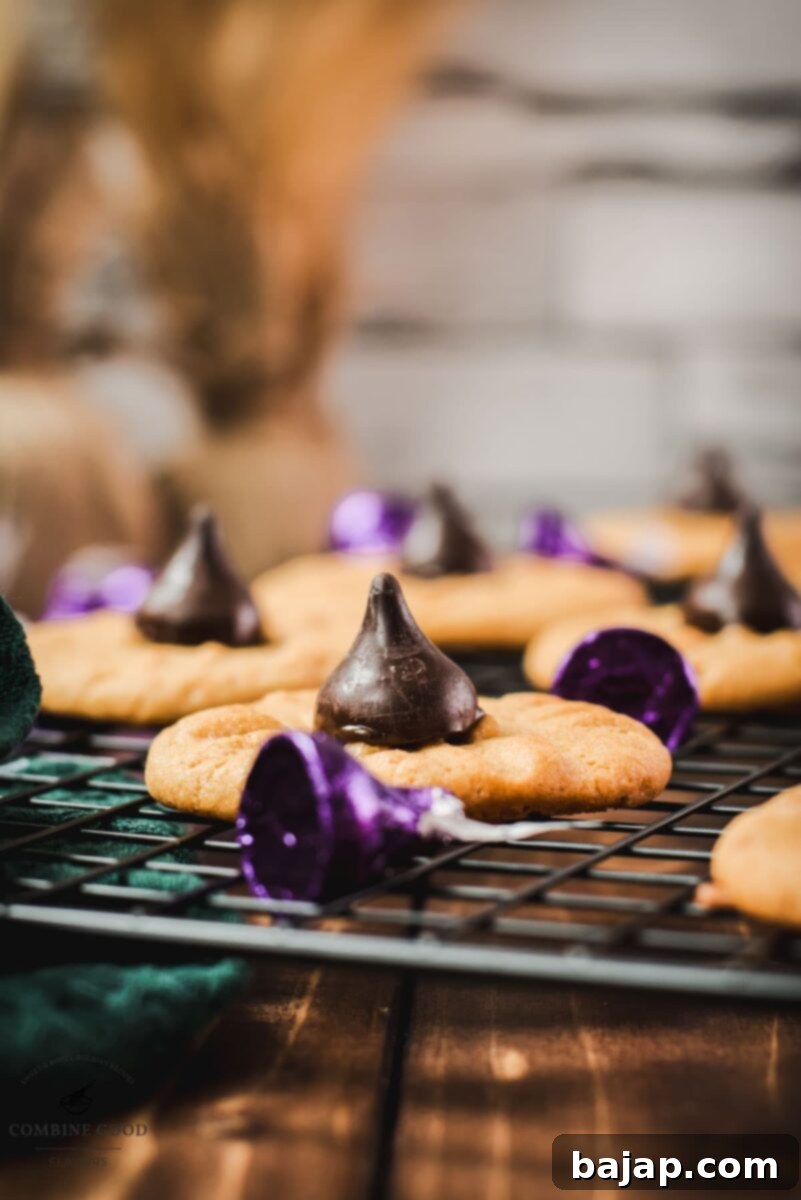 Another view of gorgeous peanut butter blossoms made with Betty Crocker cookie mix and Hershey's dark chocolate kisses, elegantly arranged on a serving dish.