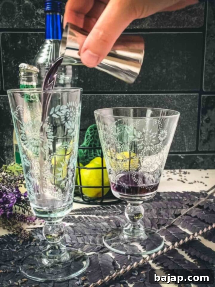 Add lavender syrup to the serving glasses.