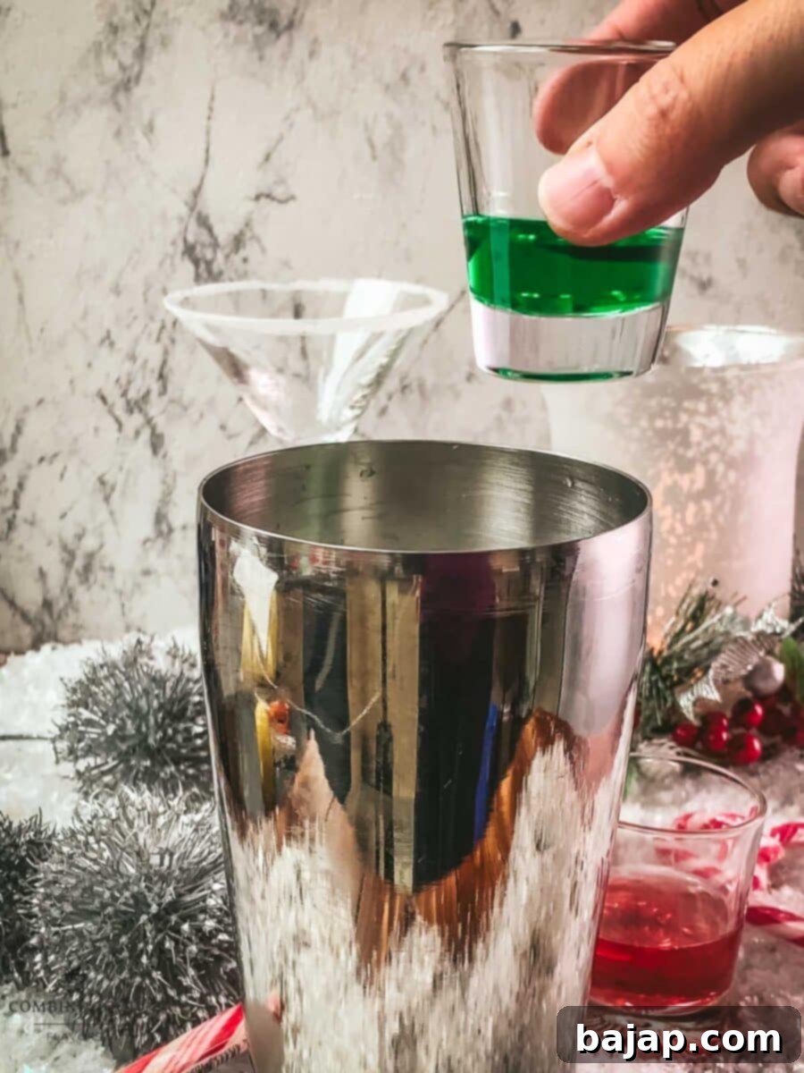 Add peppermint liqueur to the cocktail shaker.