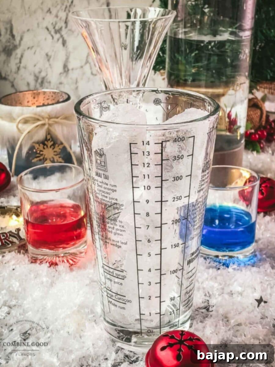 Fill your cocktail shaker with cubed ice.