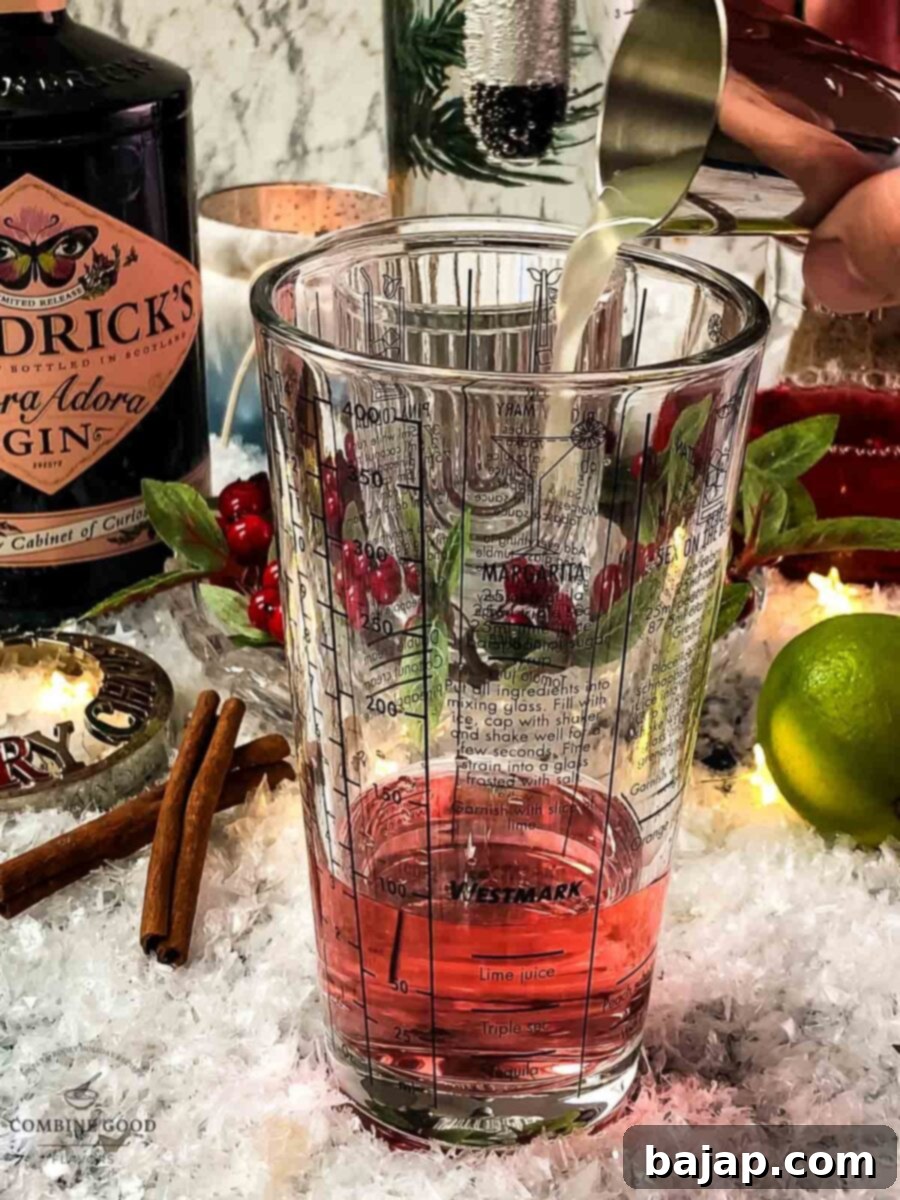 Add lime juice to the cocktail shaker.