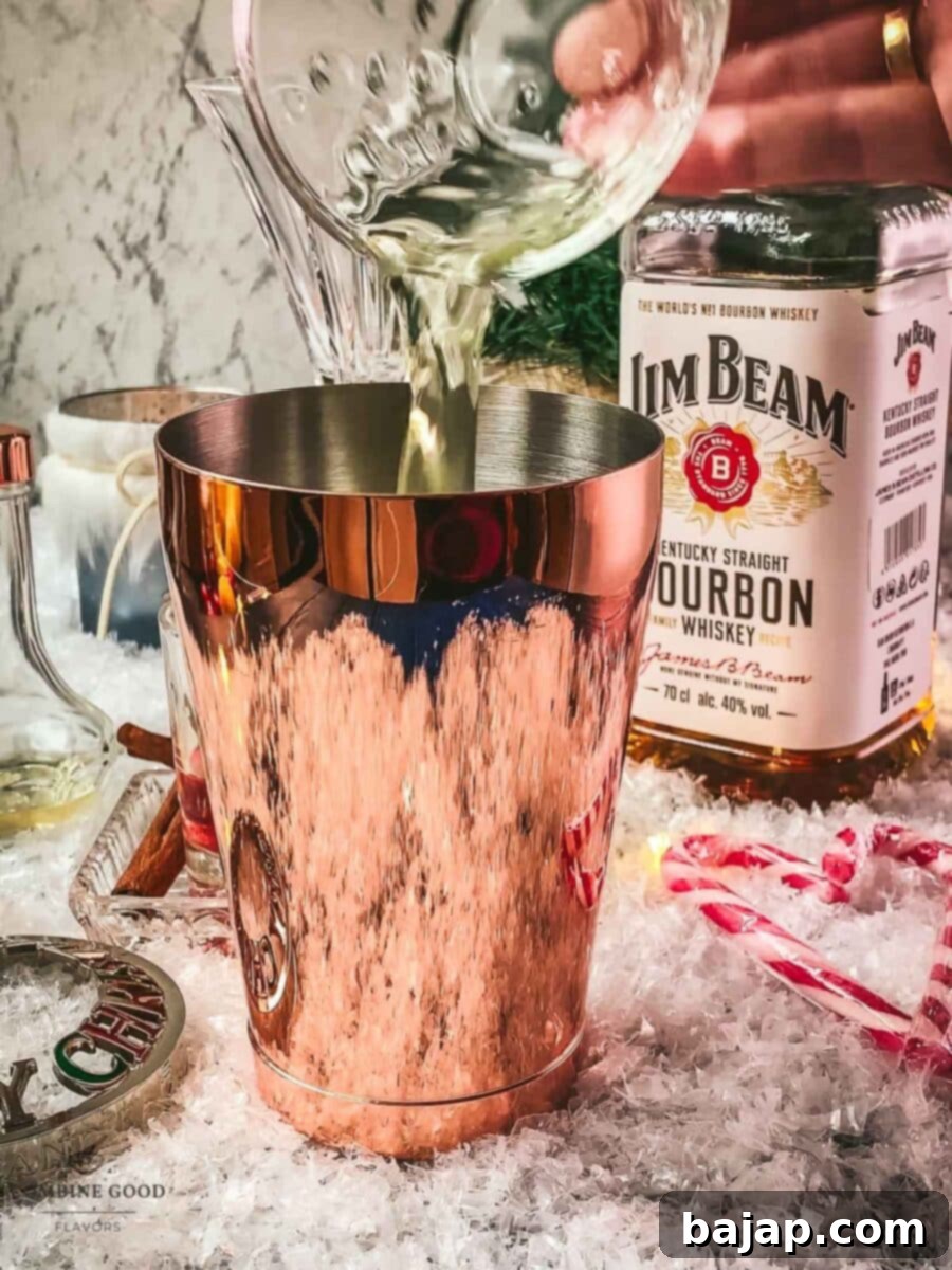 Add egg white to the cocktail shaker for the Cranberry Cinnamon Whiskey Sour.