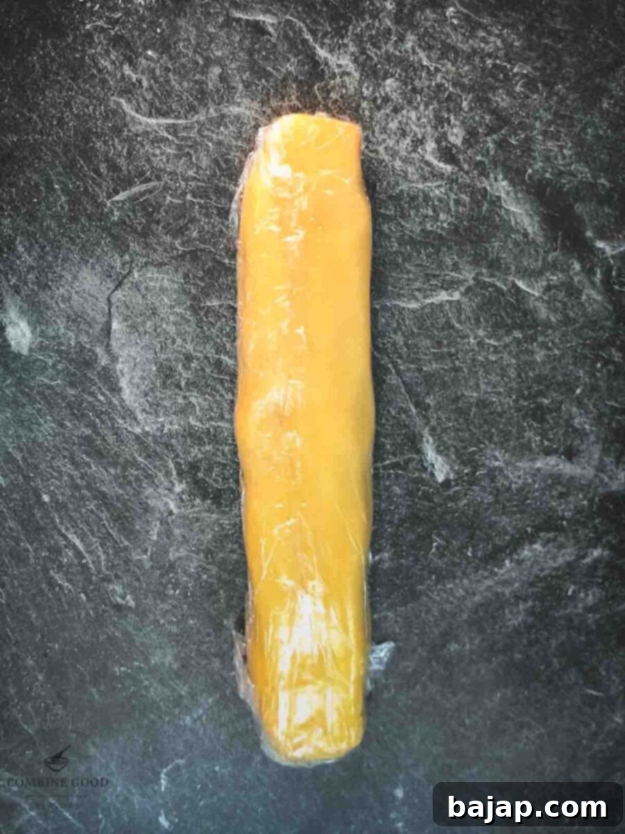 Cling film wrapped cookie dough before chilling.