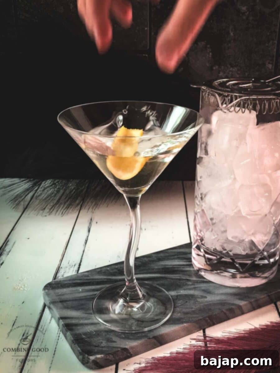 A beautifully garnished classic martini, ready to be enjoyed, exemplifying timeless cocktail perfection.