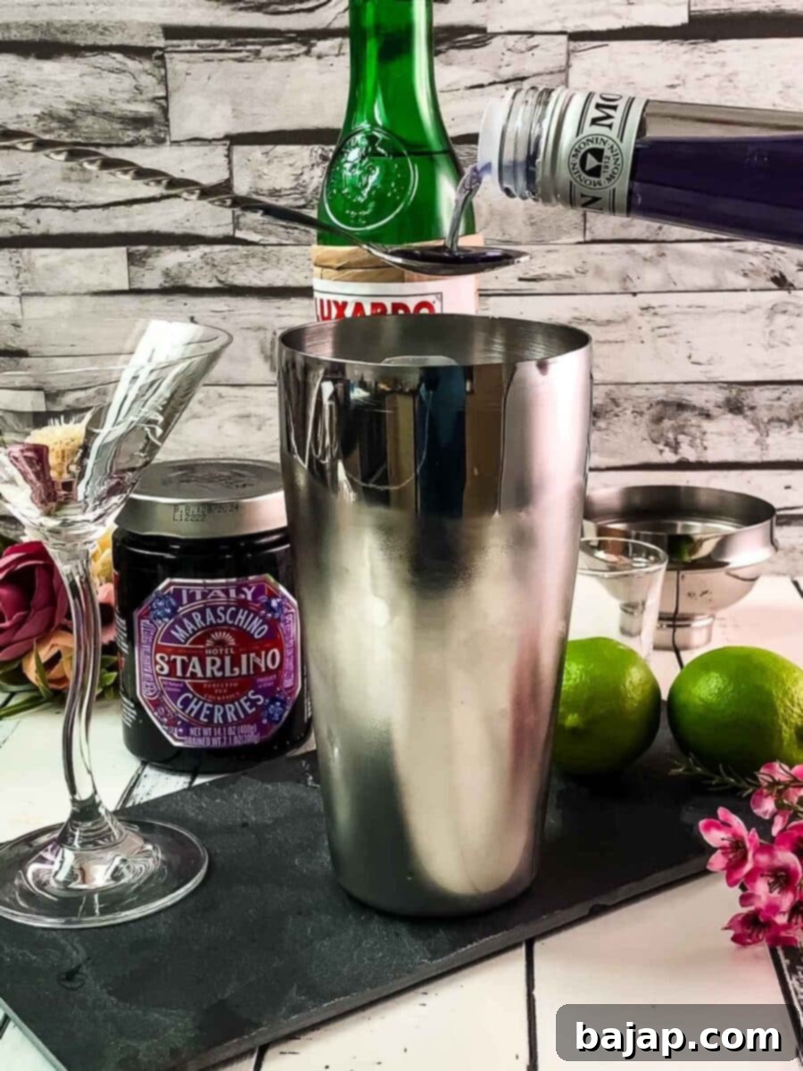 Add violett liqueur to the shaker.