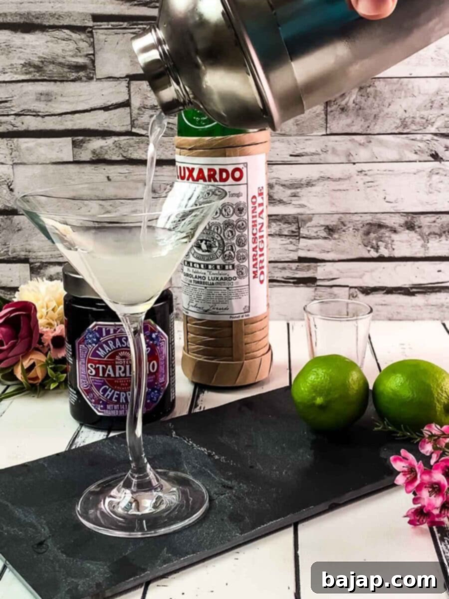 Pour the drink into a chilled cocktail glass.