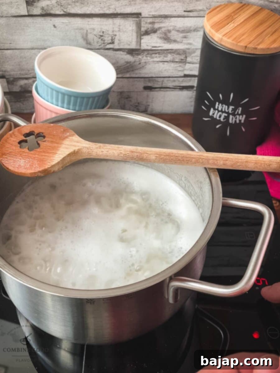 Pre-cook the rice in salted water for a few minutes.
