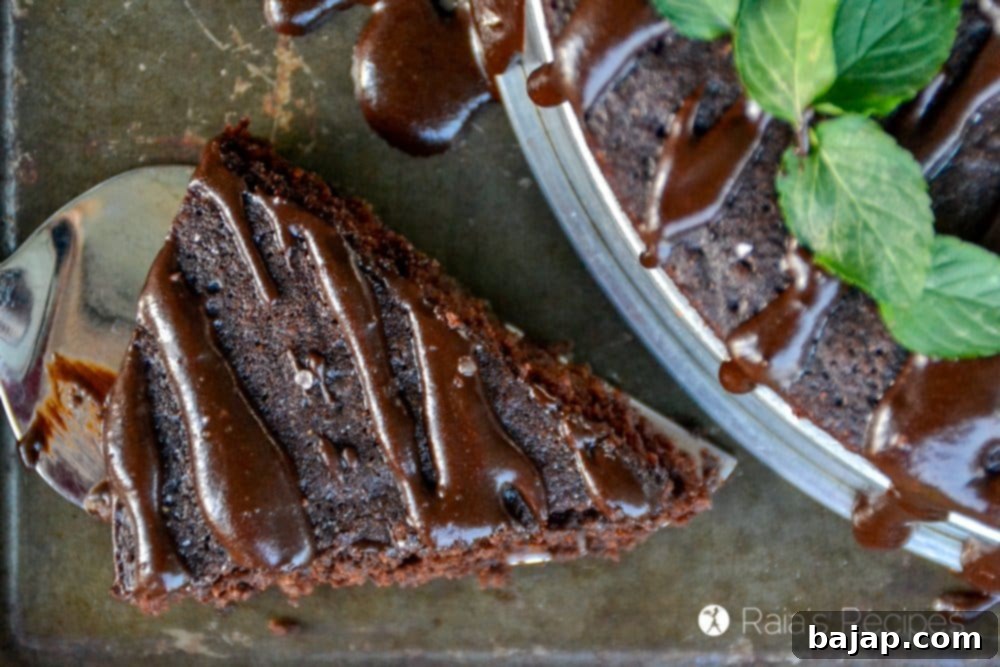 A slice of refreshing Peppermint Buttermilk Dark Chocolate Cake.